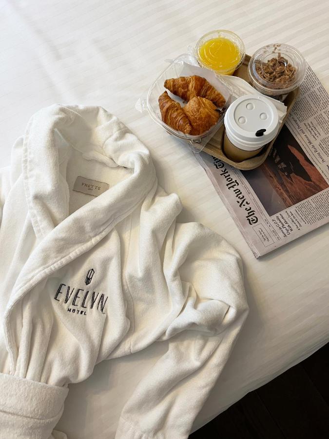 The Evelyn Nomad Hotel New York City Exterior photo A bathrobe