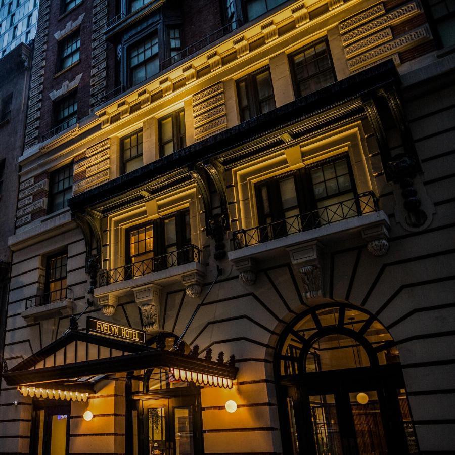 The Evelyn Nomad Hotel New York City Exterior photo The hotel's facade at night