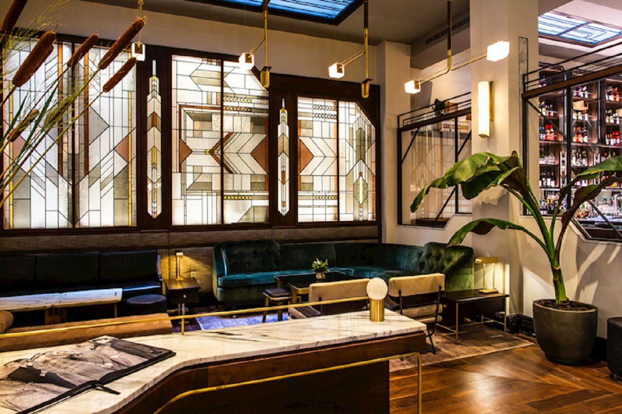 The Evelyn Nomad Hotel New York City Exterior photo The interior of the restaurant